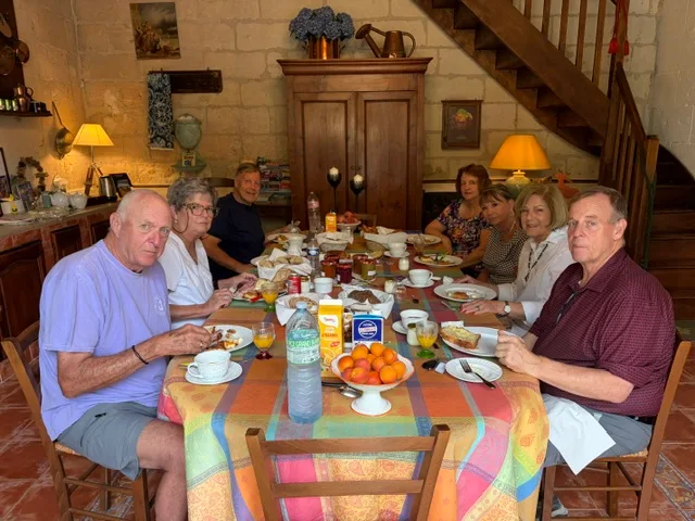 Travel Buddies at a long breakfast table in a Loire château kitchen